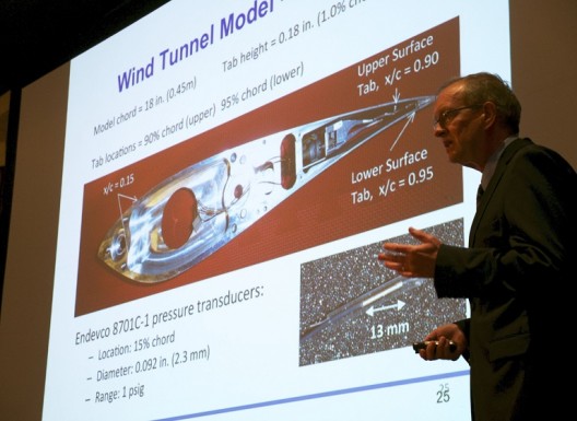 Dr. Case van Dam explaining wind tunnel model of airfoil with microtabs, actuators