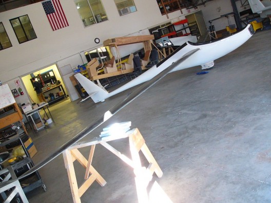 Duckhawk in Windward Performance hangar in Bend, Oregon.  Truncated nose awaits motor and spinner