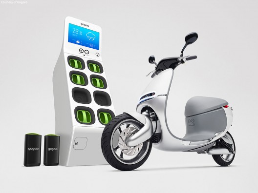 Gogoro scooter with batteries (left), charging station.  Batteries from station free owner of maintenance responsibilities, according to makers 