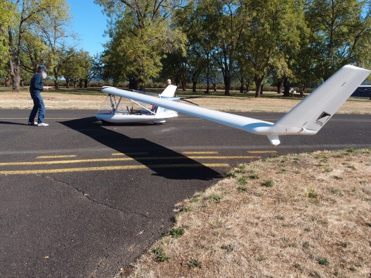 Vim Toutenhoofd tows the Swift electric glider to a starting point for its takeoff
