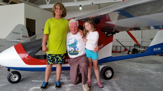 Grandson Avery (11) and granddaughter Morgan (8) with a proud grandfather
